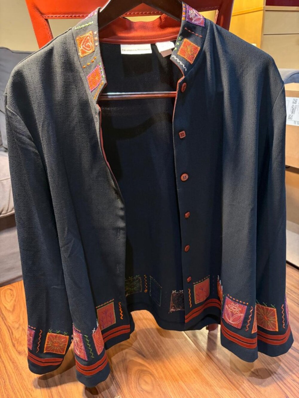 An embroided black blazer